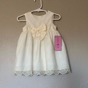 Elegant Cream Kids Dress with Bow